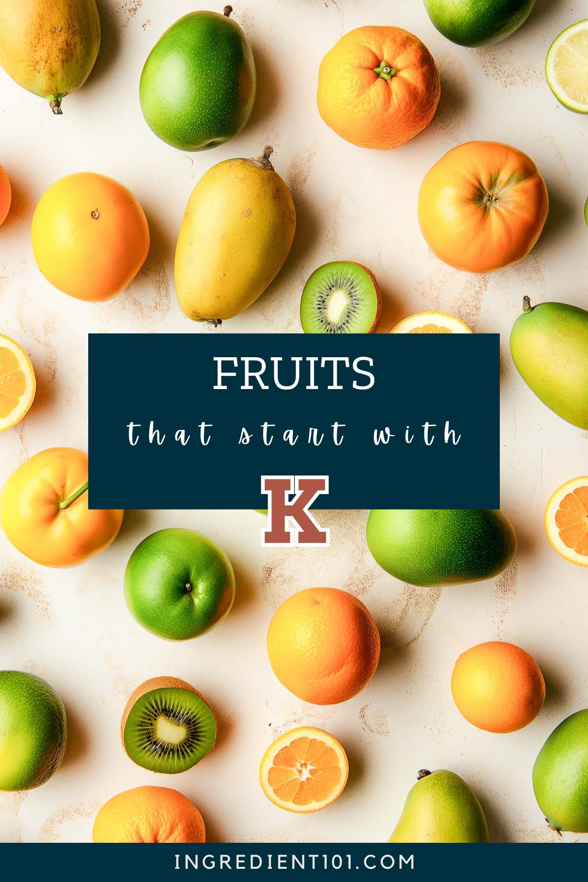 Fruit arranged on a stone surface including kiwi fruit, apples and mangoes.